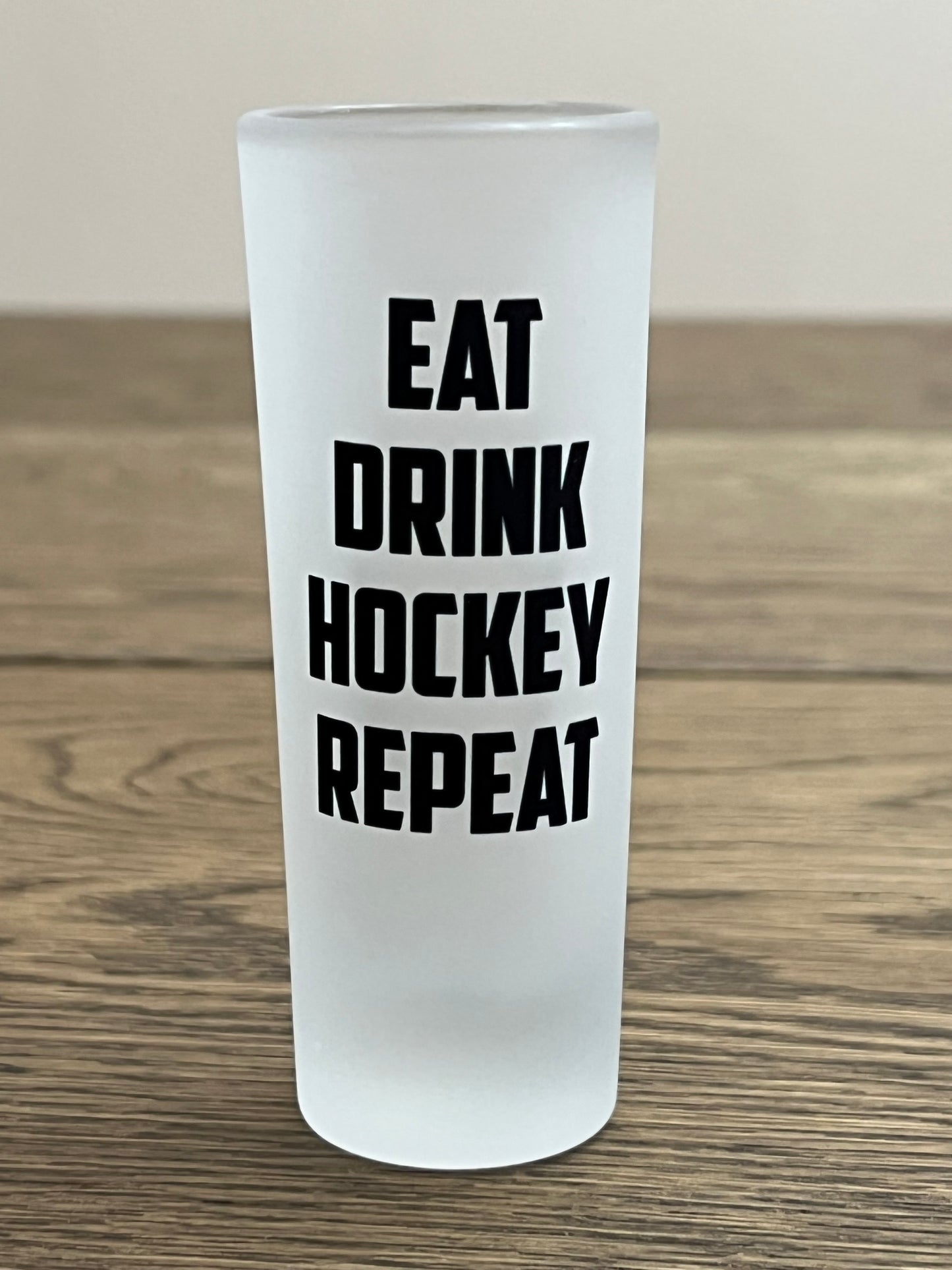 Eat Drink Hockey Repeat Shot Glass